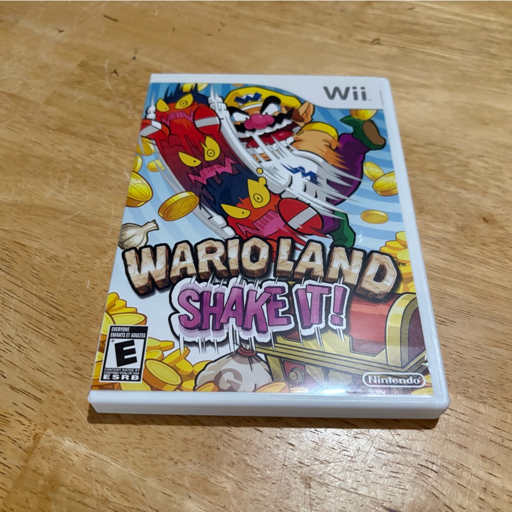 Nintendo Wario Land: Shake It! Wii Game - Colorful Adventure